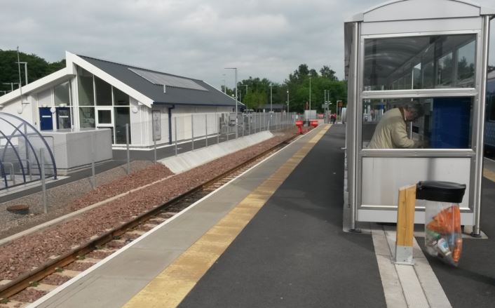 [Borders Railway]A good-quality staff building was built in the car park at the Tweedbank terminus of the Borders Railway line but rather than extend it to provide warm waiting facilities and toilets for passengers, they get nothing more than a waiting shelter on the platform
