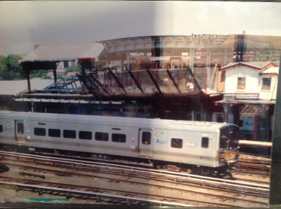 [New York]Photo of a LIRR 2 car M7 electric multiple unit taken at Jamaica Station. These trains have reliability levels that compare starkly with UK practice with 150,000 miles per casualty. The best in UK is around 50,000 miles the worst is around 1200 miles. You can see the space devoted to the disabled toilet. The "Americans with Disabilities Act" is taken very seriously. There are 1172 of these in service. They look a bit plain with their stainless steel unpainted bodies. A key priority for Railfuture is reliability. Putting a bunch of engineers in charge does have its benefits