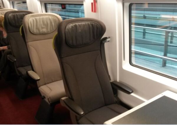 [Eurostar]Row of single seats in Standard Premier class on brand new Eurostar e320 train introduced into service in late 2015 and standing at platform in St Pancras International station